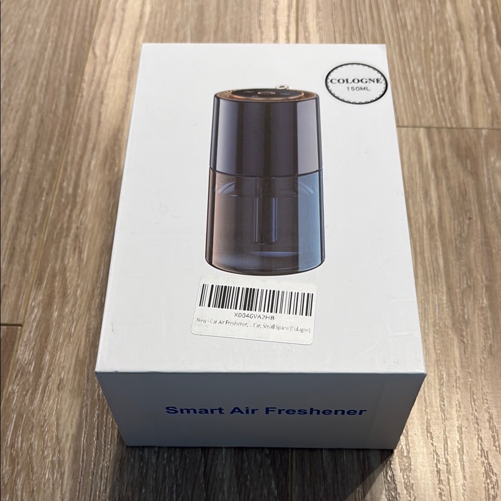 Smart Air Freshener with Silver and Black Design